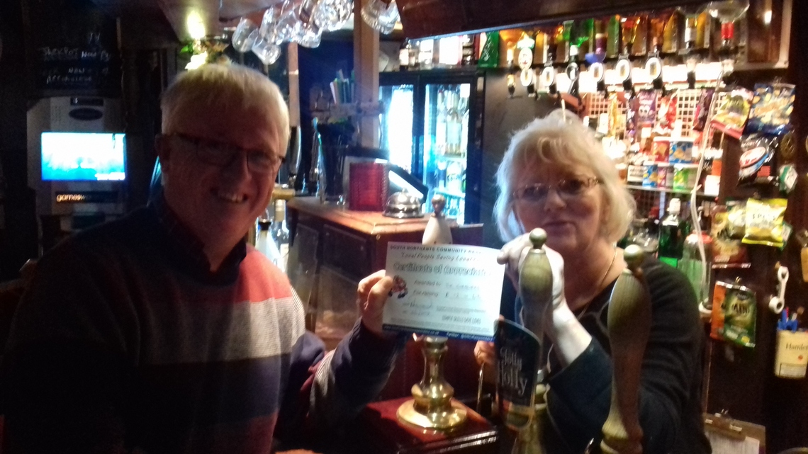 Gill Walkes receives her fund raising certificate from Martin Wilkes of South Northants REsponders